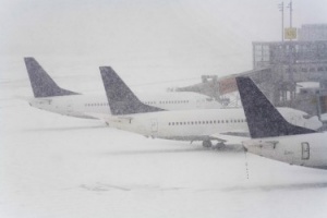 Snow causes flight cancellations in northern Europe