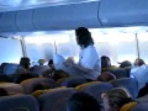 Lufthansa stewardess starts mid-air pillow fight