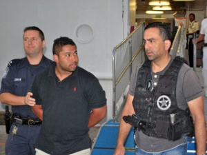 Cruise ends with jail for fugitive