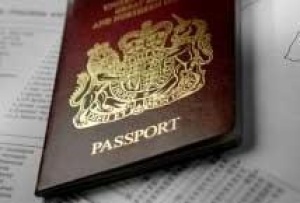 Cost of UK passport to fall by £5