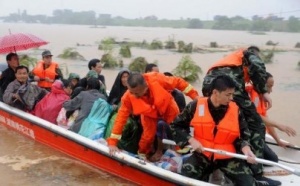 Scores feared dead in China flooding