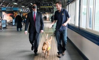 Rail boss walks blindfolded to raise awareness of first railway station guided path