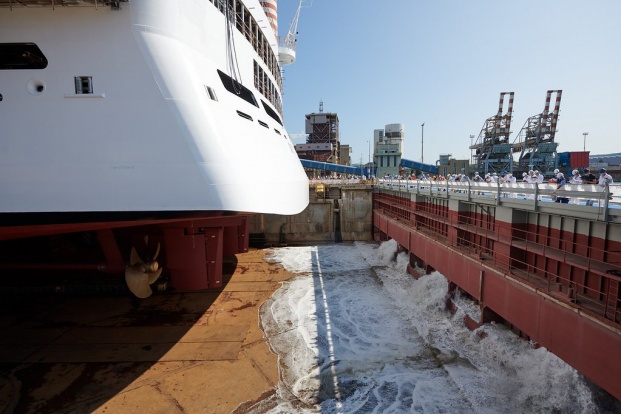 Water enters the dry dock to float MSC Seashore for the first time (2)