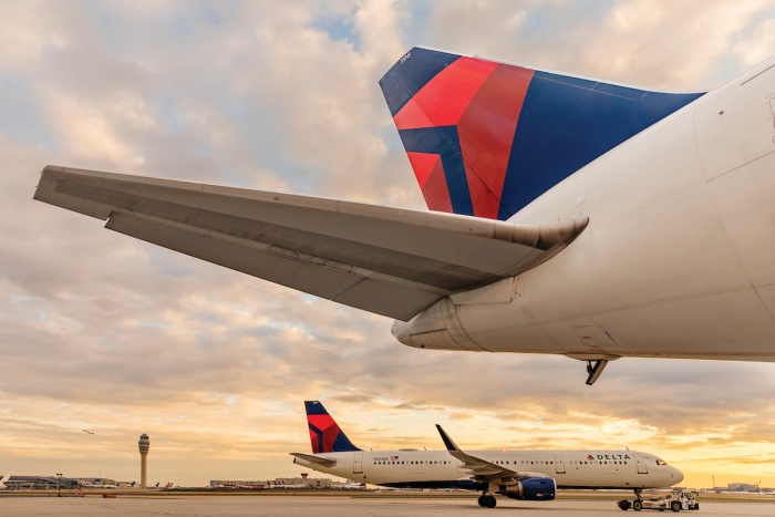 Delta looks ahead to strong summer as losses continue