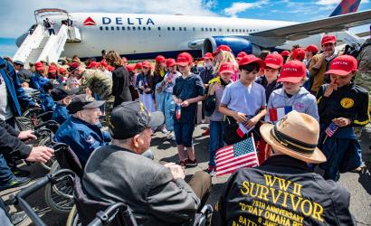 Delta connects generations with WWII veterans charter to Normandy