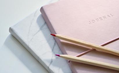 How to Create Custom Travel Journals Using Print on Demand