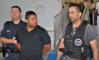 Cruise ends with jail for fugitive