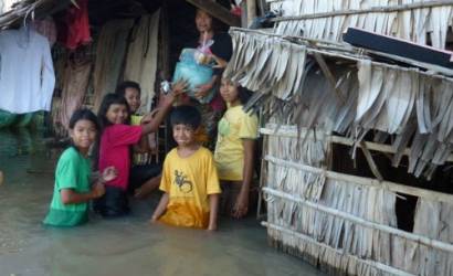 Tourism collaboration with local kids in aid of Cambodian Flood victims