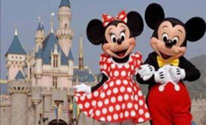 Euro Disney cuts losses as visitor numbers rise