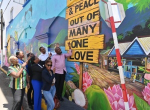 Tourism Ministry Unveils ‘Tourism and Peace: Out of Many, One Love’ Mural Downtown