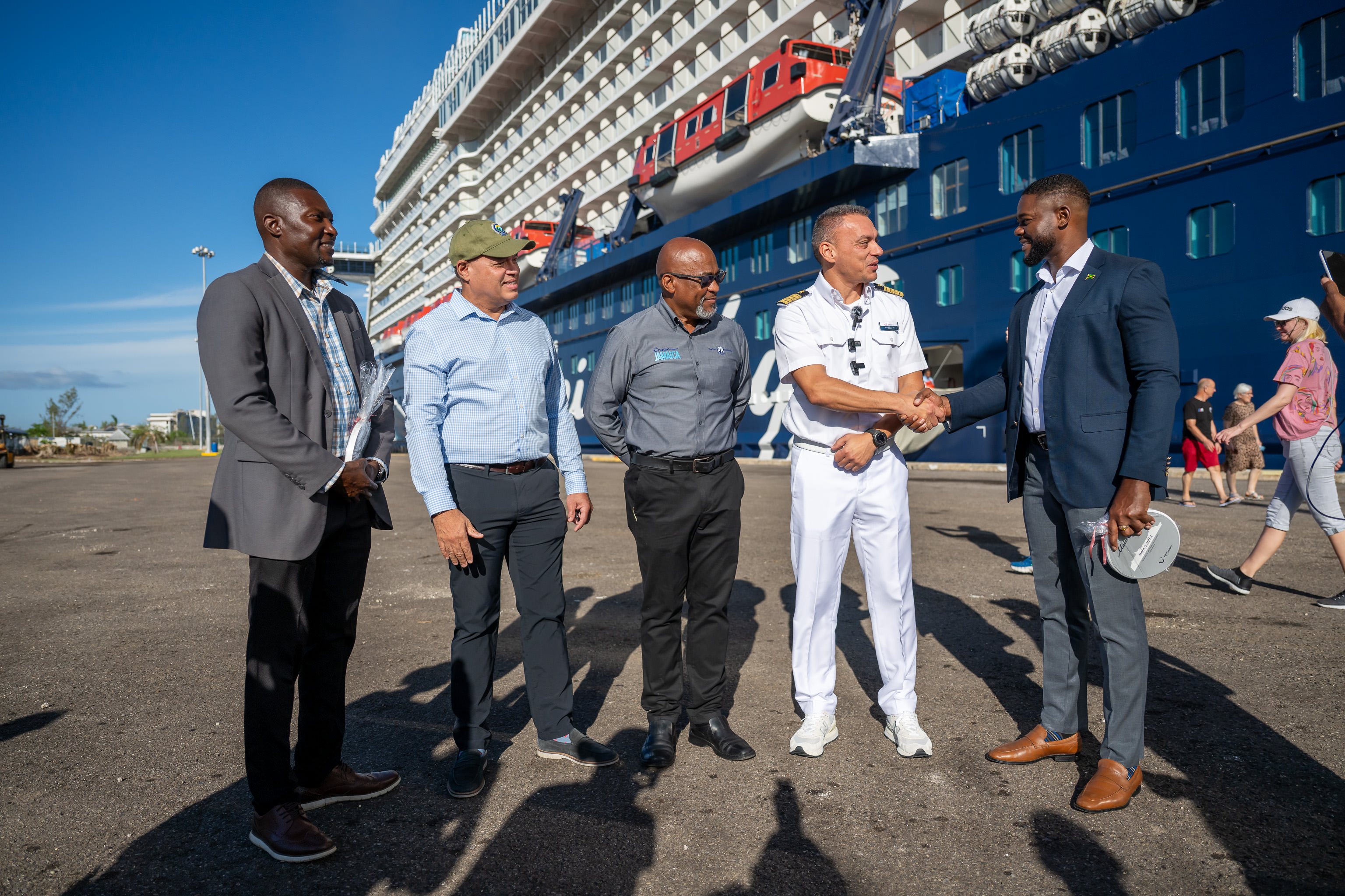 (Mobay Cruise 2) Mayor of Montego Bay, Councillor Richard Vernon (right) welcomes Captain Georgios Dimou of the TUI Cruise vessel Mein Schiff 1 after it docked at the Montego Bay Cruise Terminal on Monday, November 24, 2025. Sharing in the moment are (from left) Port Manager, Roshaun Cochrane; Chairman of the Tourism Product Development Company Limited (TPDCo) and member of the Tourism Recovery Task Force, Ian Dear and Vice President Cruise Management, Port Authority of Jamaica, Mark Hylton. 