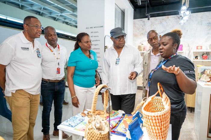 (HM MBJ) Chief Executive Officer (CEO) of MBJ Airports Limited, Shane Munroe (2nd left) confidently reassured Minister of Tourism, Hon. Edmund Bartlett (3rd right) that the Sangster International Airport (SIA) is in full operation and ready for an anticipated busy winter tourist season when it opens on December 15, 2025. The SIA was among several facilities, including large, medium and small hotels, restaurants and attractions visited by Minister Bartlett and key representatives of the Ministry and its public bodies, supported by tourism partners, during a Tourism Recovery Tour of Montego Bay on Saturday, November 29, 2025. Minister Bartlett is seen here during a walk-through of the airport terminal where he interacted with travellers, staff members of commercial entities and airport workers. Sharing in the moment are (from left) Chief Technical Director in the Ministry of Tourism, David Dobson; Jennifer Griffith, Permanent Secretary in the Ministry of Tourism and Christopher Jarrett, President of the Jamaica Hotel and Tourist Association (JHTA).